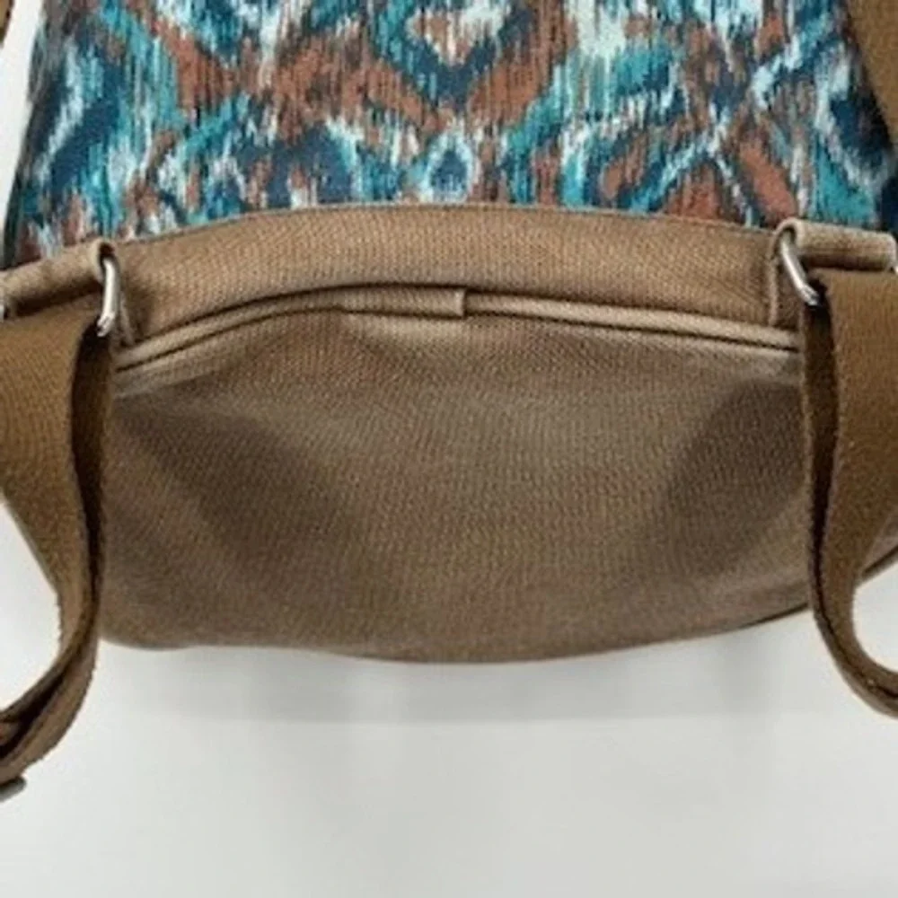 TOMS Ikat Southwestern Canvas Drawstring Backpack Teal Brown Boho Festival Bag